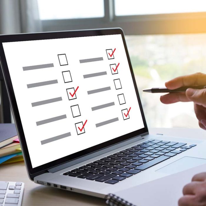 audit checklist on laptop
